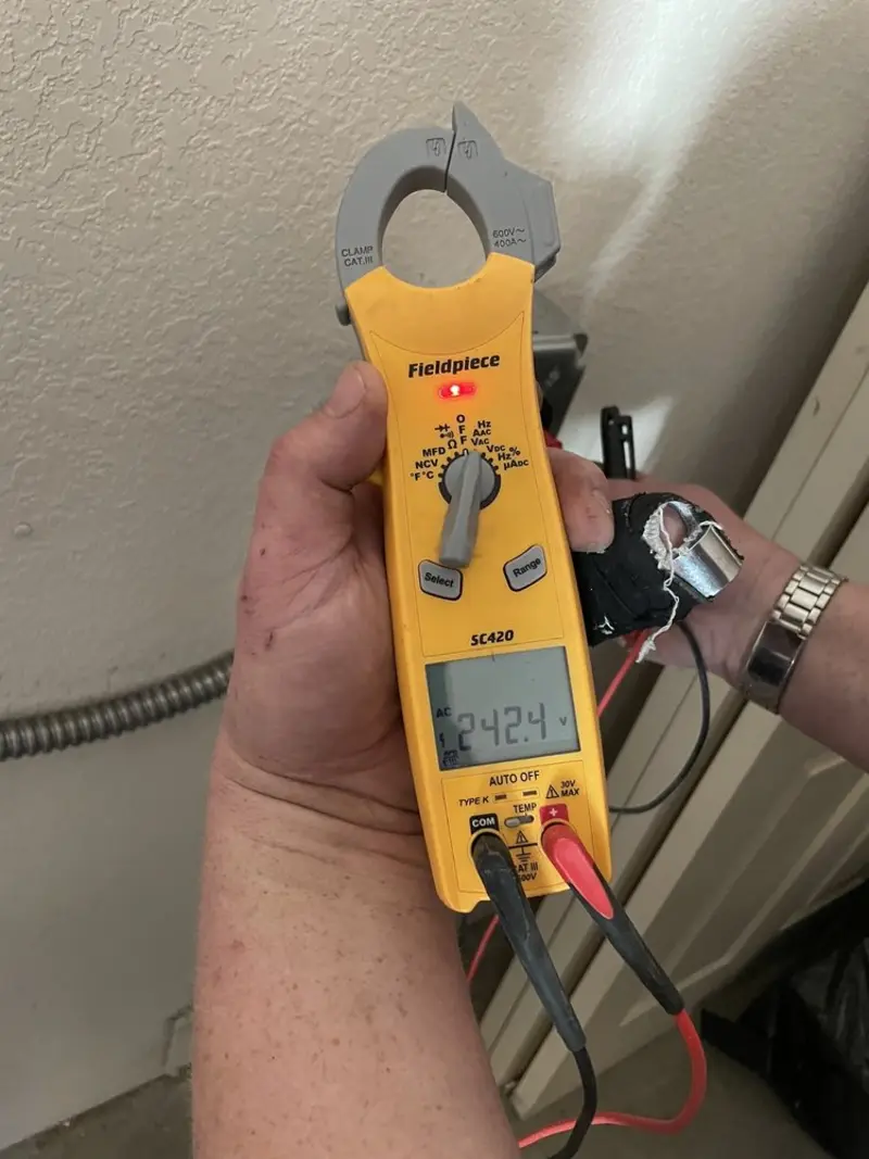 Voltage testing with clamp meter during Circuit Breaker Repair in Upper Mount Bethel